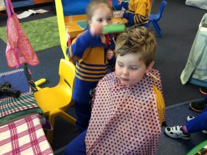 Even the boys were happy to get their hair 'done'!